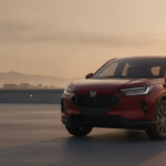 Red midsize SUV illustrating the expected Honda Elevate facelift, photographed at golden hour.
